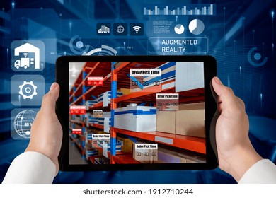 Smart warehouse management system using augmented reality technology to identify package picking and delivery . Future concept of supply chain and logistic business .
