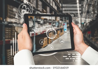 Smart warehouse management system using augmented reality technology to identify package picking and delivery . Future concept of supply chain and logistic business . - Powered by Shutterstock