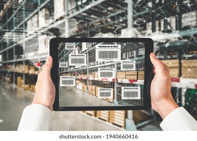 Smart warehouse management system using augmented reality technology to identify package picking and delivery . Future concept of supply chain and logistic business .