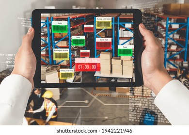 Smart warehouse management system using augmented reality technology to identify package picking and delivery . Future concept of supply chain and logistic business .