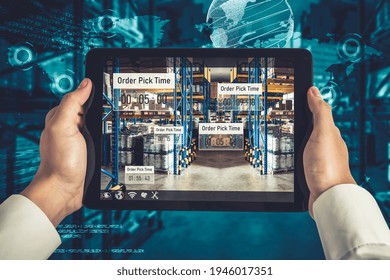 Smart warehouse management system using augmented reality technology to identify package picking and delivery . Future concept of supply chain and logistic business .