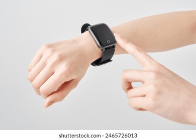 smart watch on a woman's wrist - Powered by Shutterstock