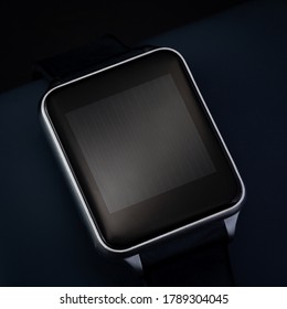 Smart Watch In A Studio Shot With Highly Controlled Lighting. The Watch Is Off.