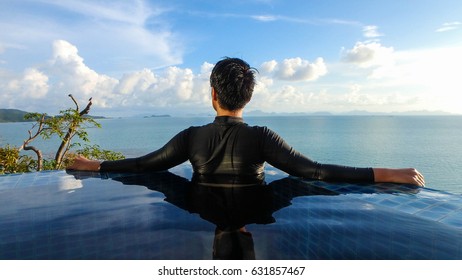 smart woman looking wide vision panorama seascape sunny day - Powered by Shutterstock