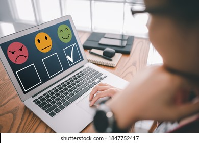 Smart Woman Use Laptop Choosing Green Happy Smile Face Icon. Feedback Rating And Positive Customer Review Experience, Satisfaction Survey. Mental Health Assessment. World Mental Health Day Concept