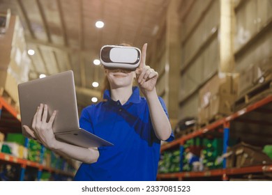 smart worker using modern advance technology digital VR device to control operate manage industry products stock warehouse  - Powered by Shutterstock