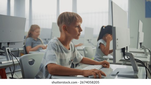 Smart Young Boy Using Computer, Doing Creative 3D Design Project. African American Teacher Helping Elementary School Children in Learning Coding During Digital Programming Lesson. STEM Education. - Powered by Shutterstock - Get 15% off with code: PIKWIZARD15