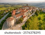 Smartno townscape and vineyards in Goriska Brda countryside region of Slovenia. Aerial view of the Smarno old town at sunset