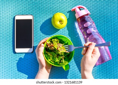 Smartphone app for sport workout, easy healthy breakfast salad and water