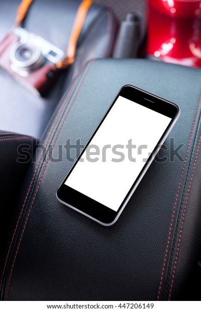 smartphone with a blank screen in car for text\
and content