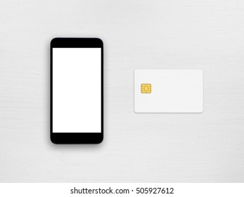 Smartphone And Credit Card On White Table Top View