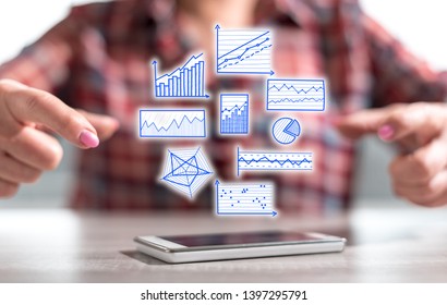 Smartphone with data analysis concept between hands of a woman in background