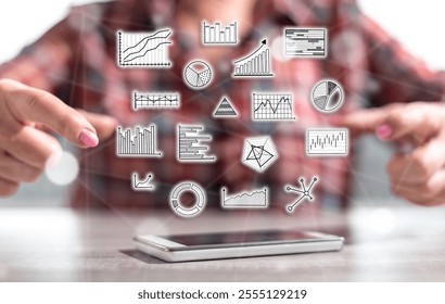 Smartphone with data analysis concept between hands of a woman in background