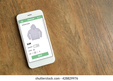 Smartphone with ecommerce website screen
