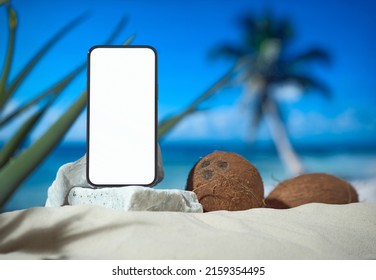 Smartphone With Empty Template Screen On Podium At Beach, Mockup. Mobile Phone On Pedestal. Ad Of Air Travel Apps