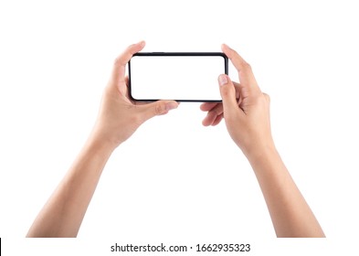Smartphone in female hands taking photo isolated on white blackground - Shutterstock ID 1662935323