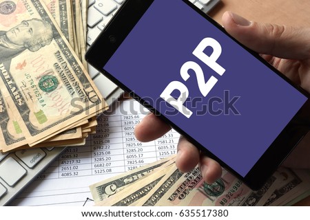 Smartphone in hand with message P2P. Peer to peer lending concept.