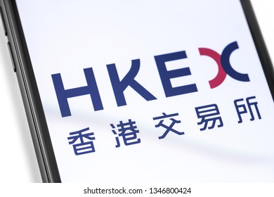 smartphone with HKEX logo on the screen. HKEX - Hong Kong Stock Exchange. Moscow, Russia - March 17, 2019
