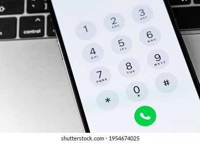 Smartphone IPhone With Phone App Numbers Keyboard, Numeric Keypad On Screen. Phone App To Make And Receive Phone Calls On Your Apple IPhone. Moscow, Russia - January 23, 2021