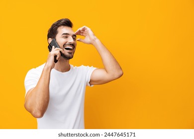 Smartphone man space communication mobile cyberspace happy smiling portrait yellow phone copy phone - Powered by Shutterstock