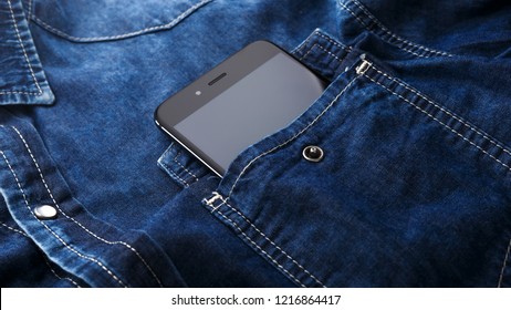 Smartphone Mobile In Blue Jeans Shirt Pocket With Black Screen