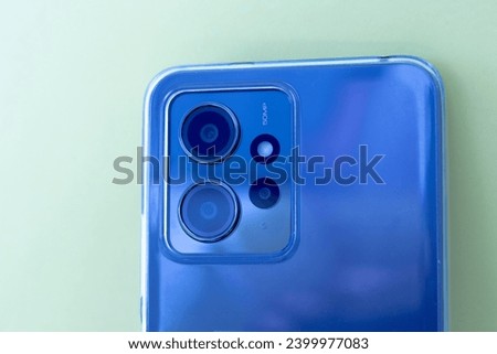 smartphone - mobile Phone back camera 50 MP camera lenses and flash light close up.