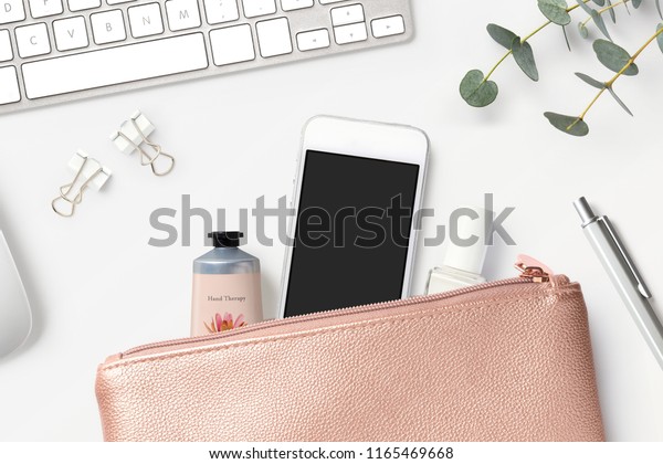 white and rose gold clutch bag