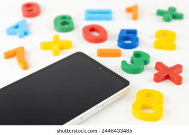 Smartphone and numbers. Image of math study app