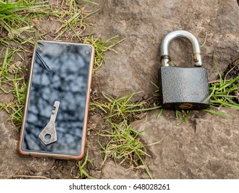 Smartphone, old key, lock - security idea, concept