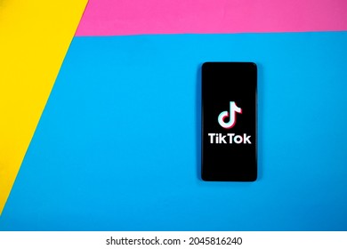 Smartphone On A Colorfull Background With Tik Tok App On It