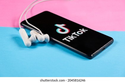 Smartphone On A Colorfull Background With Tik Tok App On It