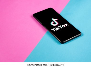 Smartphone On A Colorfull Background With Tik Tok App On It