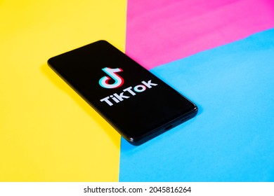 Smartphone On A Colorfull Background With Tik Tok App On It