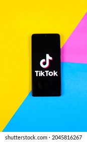 Smartphone On A Colorfull Background With Tik Tok App On It