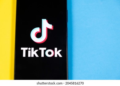 Smartphone On A Colorfull Background With Tik Tok App On It