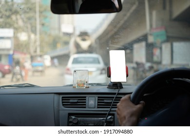 A smartphone on head-up display background in a car