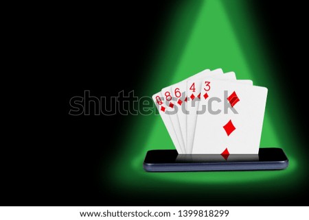 smartphone with poker cards, card game Color, poker cards that come from the cell phone screen