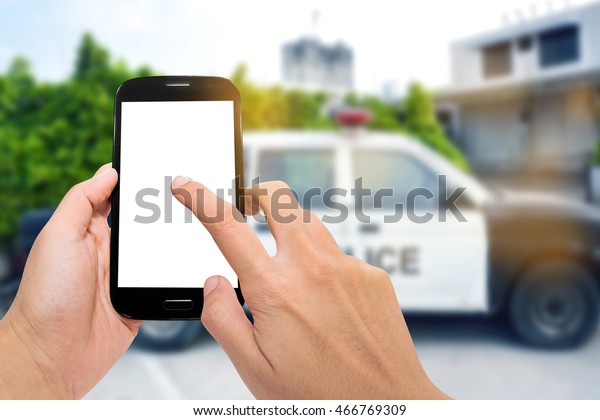 Smartphone with police\
car.
