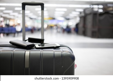 Smartphone With Power Bank On The Travel Bag Or Luggage. Smartphone Connection Concept At The International Airport. Copy Space.