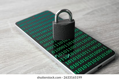 A smartphone with a screen displaying binary code with metal closed padlock. A concept of internet and cyber security.