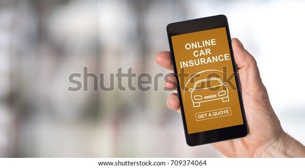 Smartphone screen displaying an online car\
insurance concept