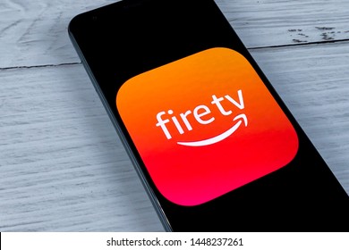 Smartphone showing Amazon Fire Tv application logo on an a screen. Manhattan, New York, USA - July 4, 2019.