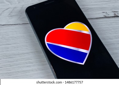 Smartphone Showing Southwest Airlines Application Logo On An A Screen. Manhattan, New York, USA - July 30, 2019.