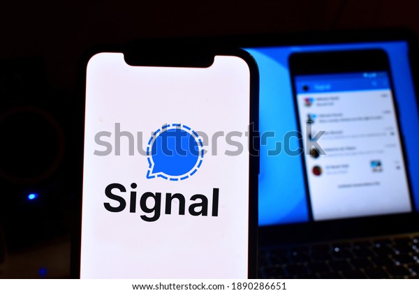 Smartphone with the Signal logo is a free and open\
source instant messaging and calling application. United States,\
California July 9,\
2021