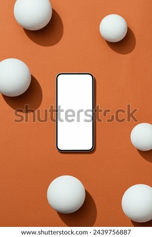 Smartphone template with copy space screen on brown background with geometric objects