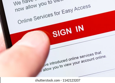 smartphone touch screen with red button sign in. business e-commerce concept.