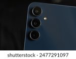 Smartphone triple cameras in close detail