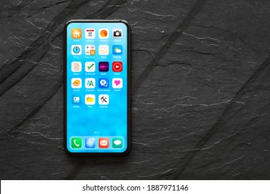 Smartphone's home screen mockup with app icons - Shutterstock ID 1887971146