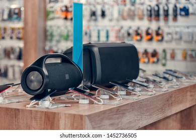 Smartphones On The Background Of The Electronics Store. Department Of Mobile Phones In The Tech Store. A Modern Gadget Store