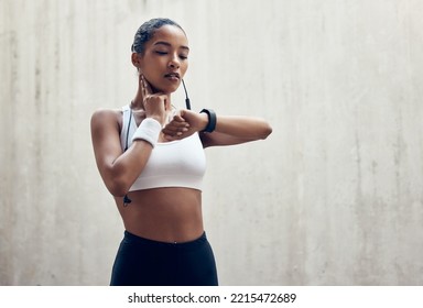 Smartwatch, Fitness And Thinking Black Woman Check Time Running Results Or Training Workout Progress On Wall Mock Up Marketing. Sports Athlete With Smart Watch For Exercise Goal Or Idea Mock Up